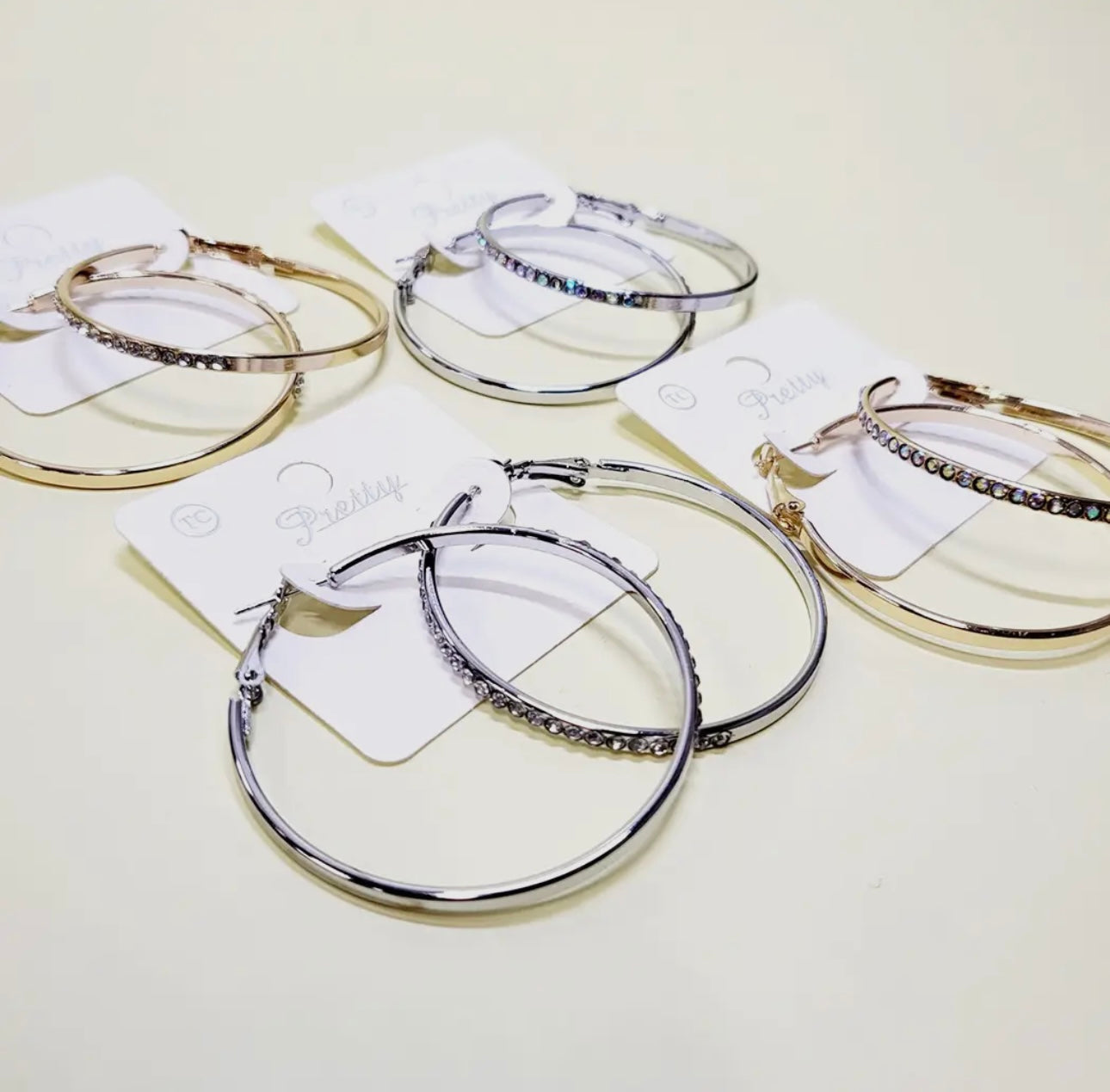 Gold and silver stoned hoop earrings