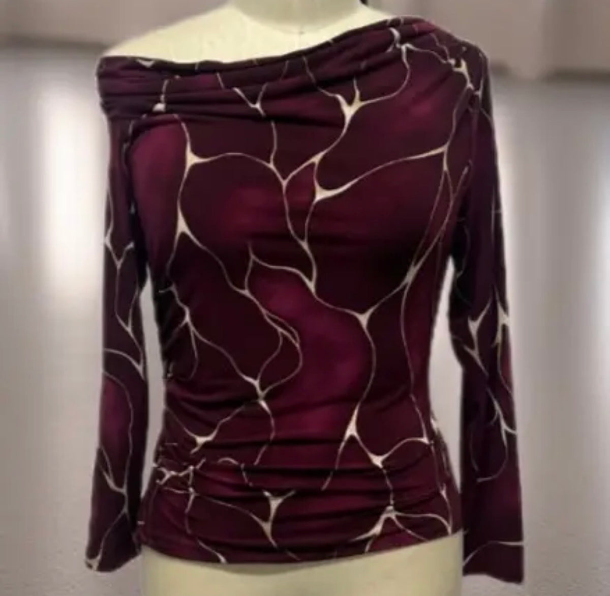 Plus size abstract print off shoulder cowl neck top